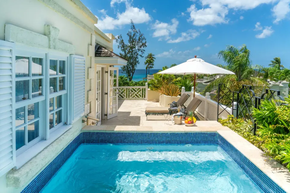 Luxury Suite private plunge pool and terrace with ocean view at Coral Reef Club.