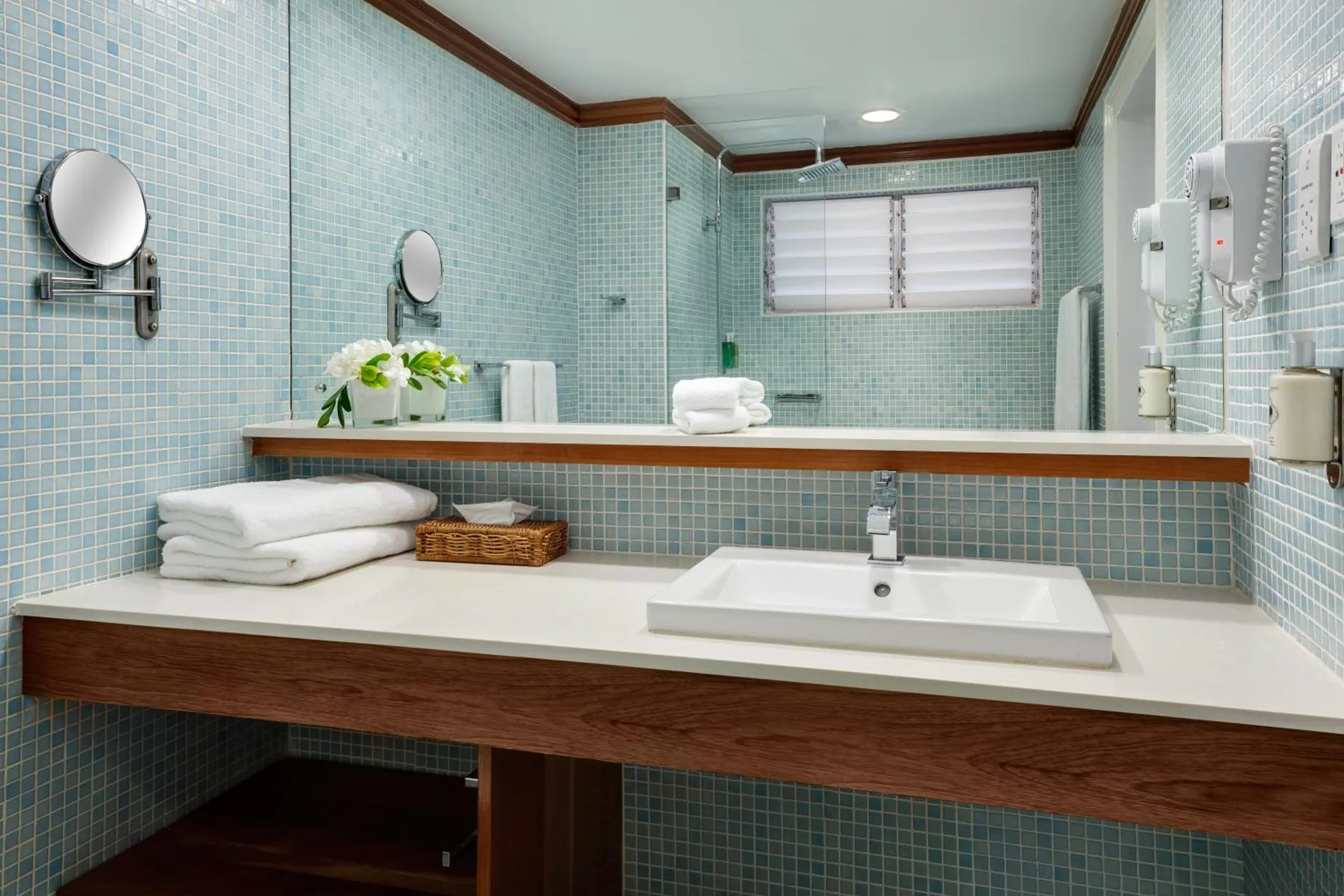 Deluxe Garden bathroom sink and shower area at Couples Negril.