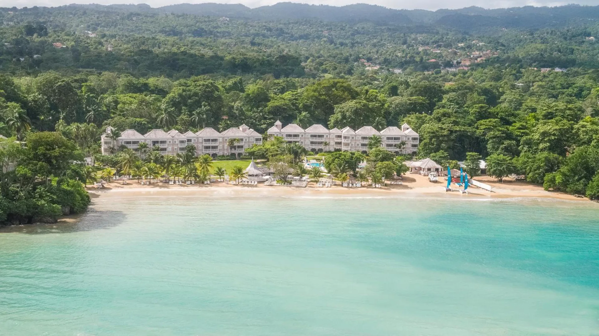 Aerial view of the beachfront and turquoise bay at Couples Sans Souci.