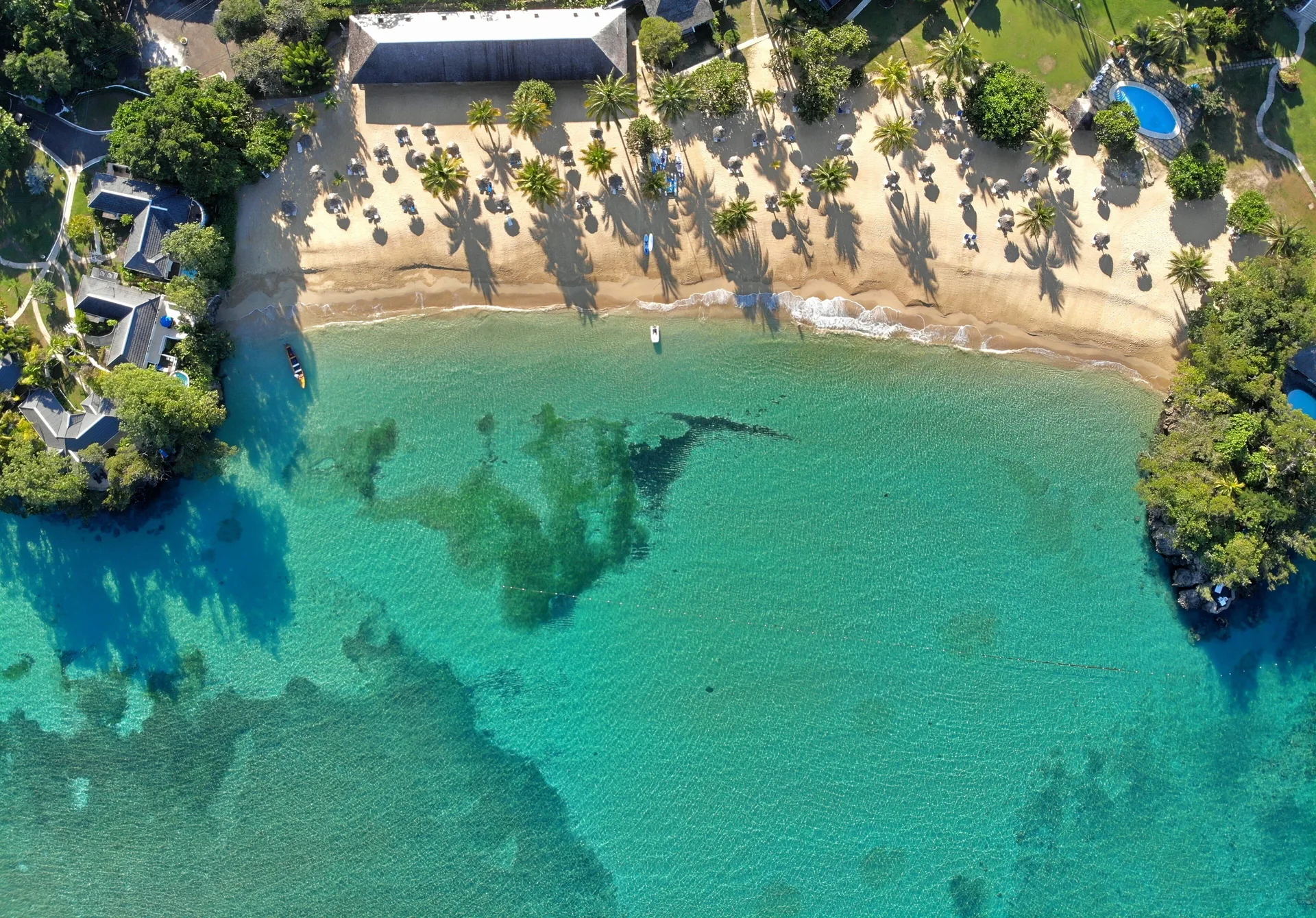 Jamaica Inn luxury boutique hotel in Ocho Rios with private beach, colonial architecture, and intimate oceanfront suites.