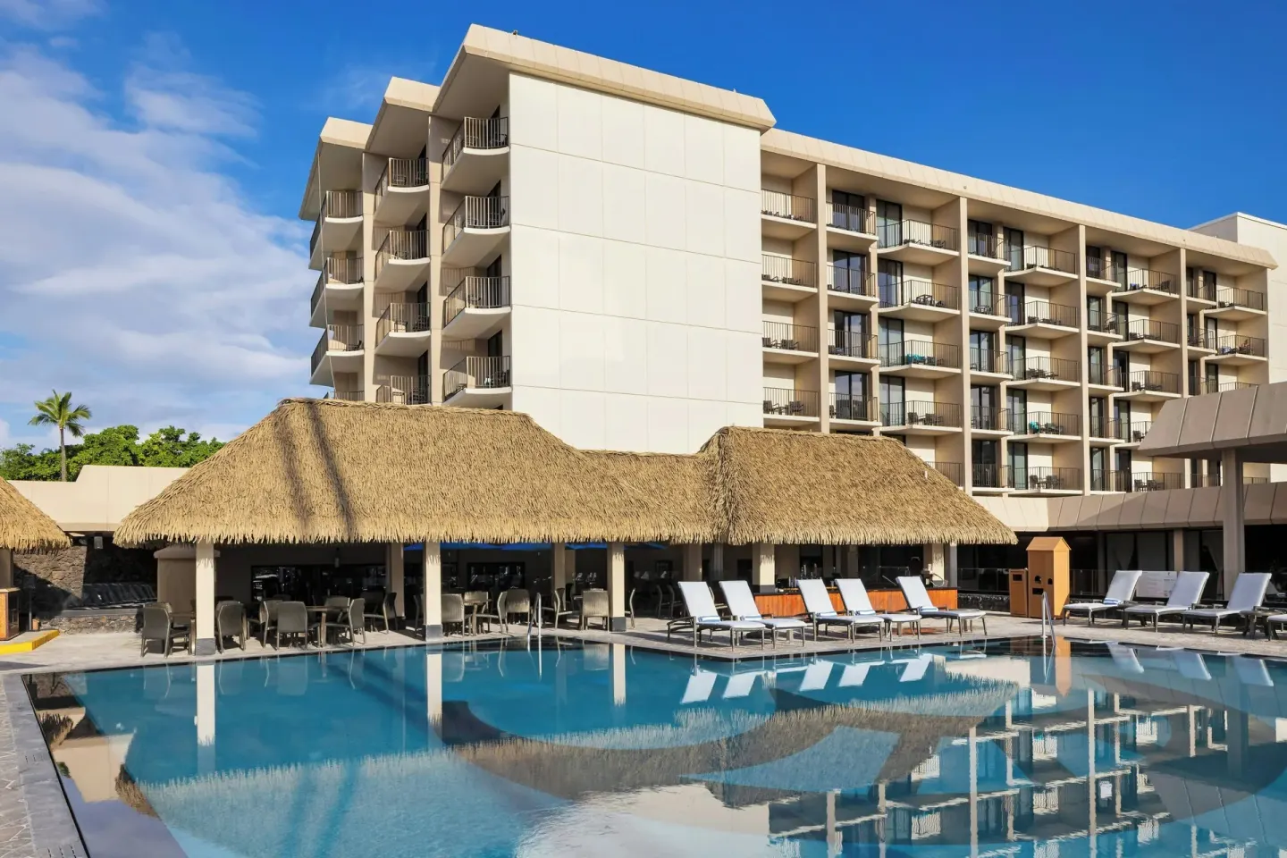 Pool and hotel balconies at Courtyard King Kamehameha's Kona Beach Hotel.