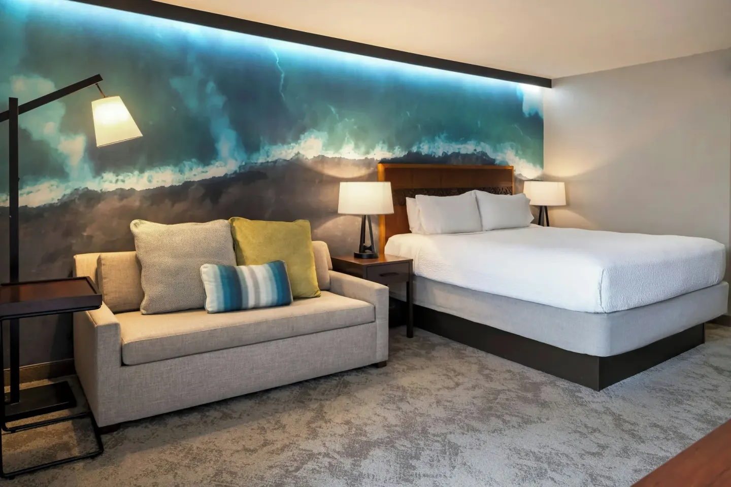 King guest room with sofa bed at Courtyard King Kamehameha's Kona Beach Hotel.