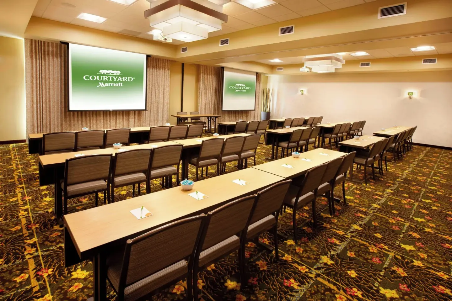 Large meeting room set classroom style at Courtyard Maui Kahului Airport.