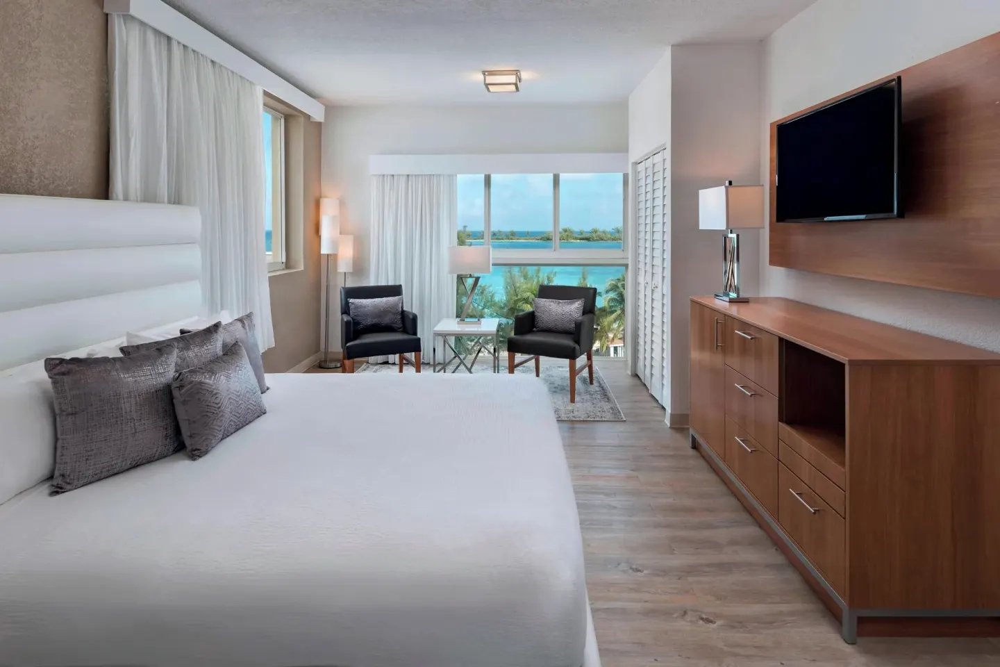 King guest room with water view at Courtyard Nassau Downtown/Junkanoo Beach.