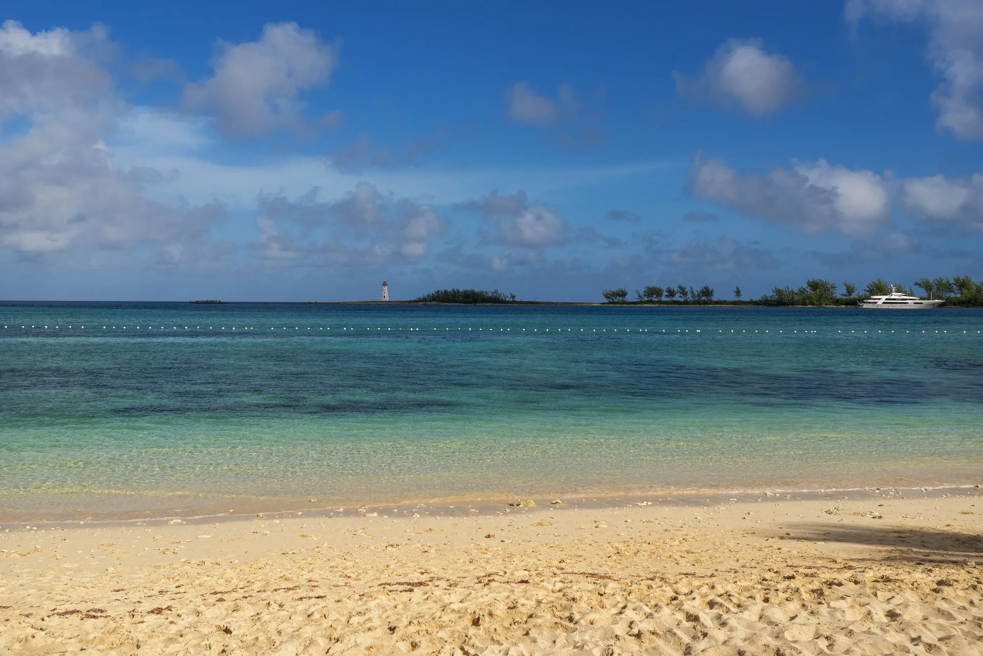 Sandy beach and turquoise water near Courtyard Nassau Downtown/Junkanoo Beach.