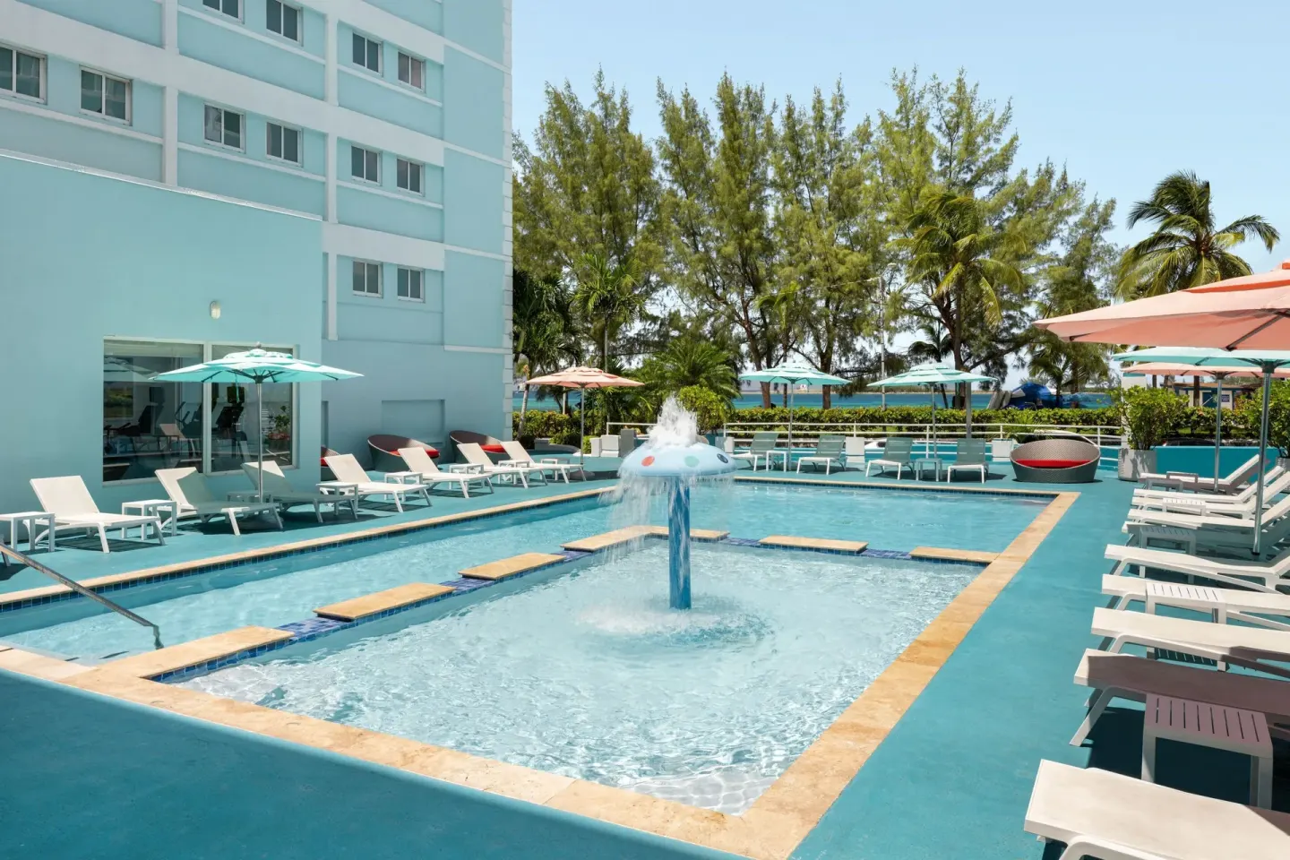 Outdoor pool with fountain at Courtyard Nassau Downtown/Junkanoo Beach.