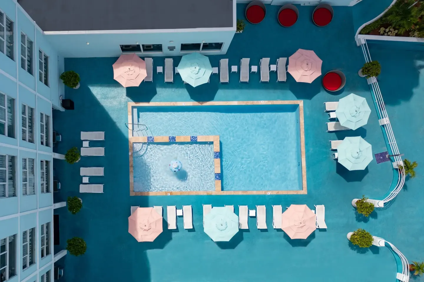 Overhead view of the pool courtyard at Courtyard Nassau Downtown/Junkanoo Beach.