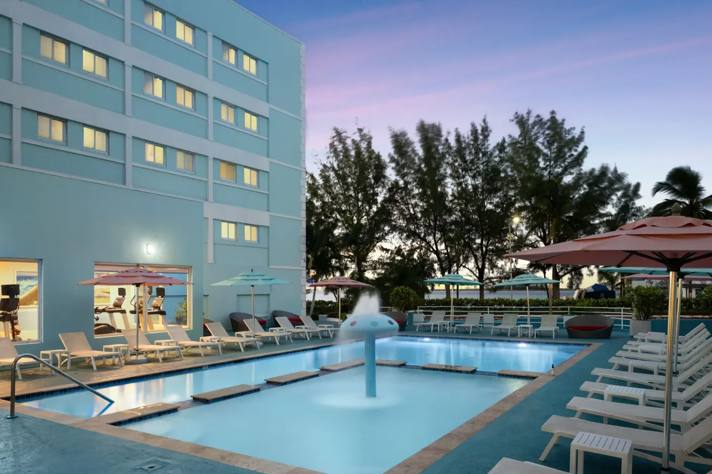 Pool deck at dusk at Courtyard Nassau Downtown/Junkanoo Beach.