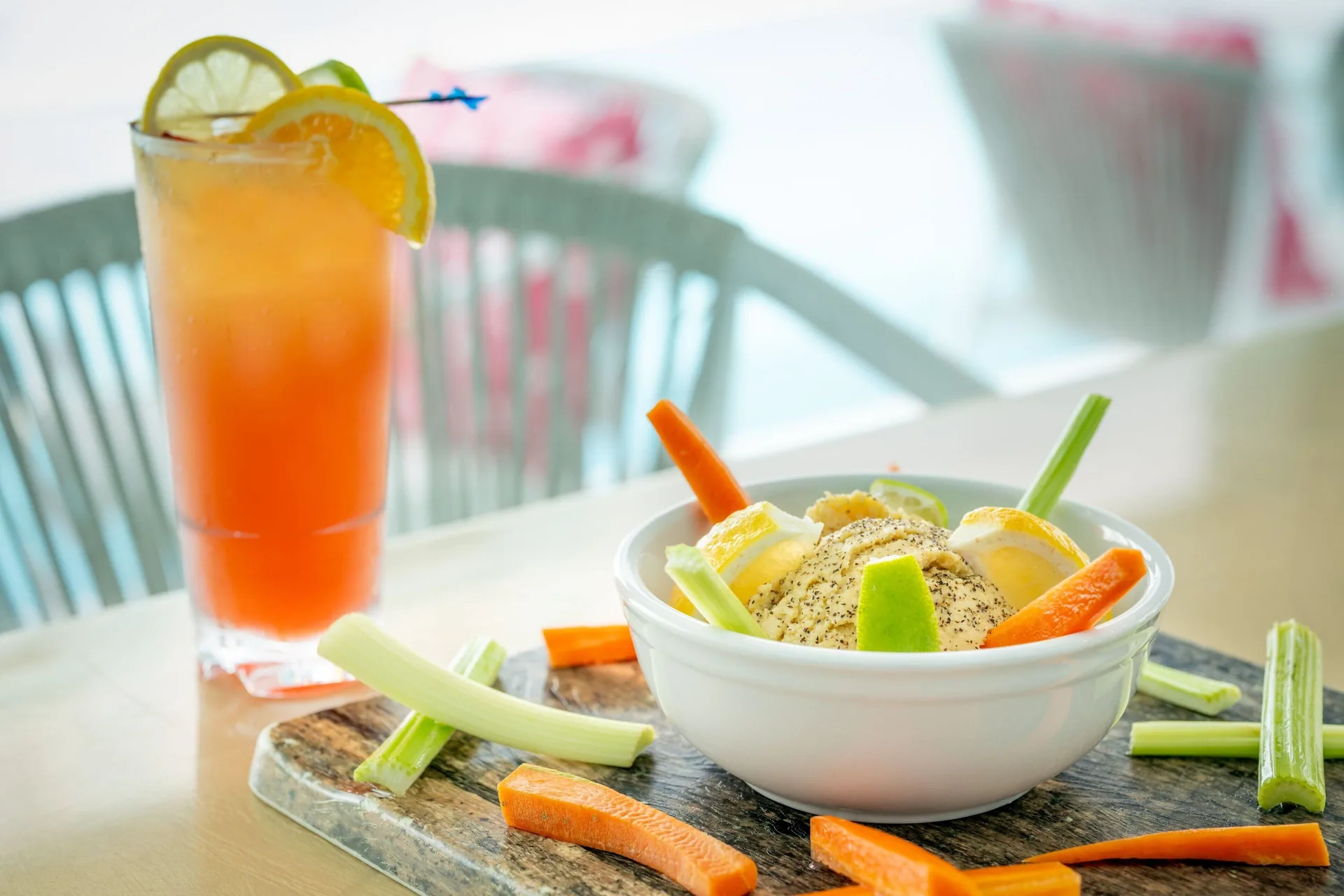 Vegetable snack bowl and citrus drink at Courtyard Nassau Downtown/Junkanoo Beach.