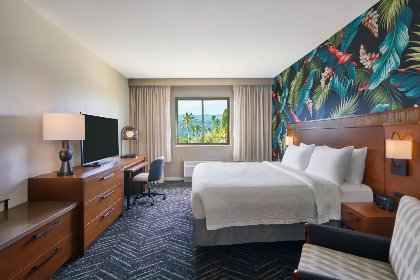 King guest room with palm and mountain view at Courtyard Oahu North Shore.