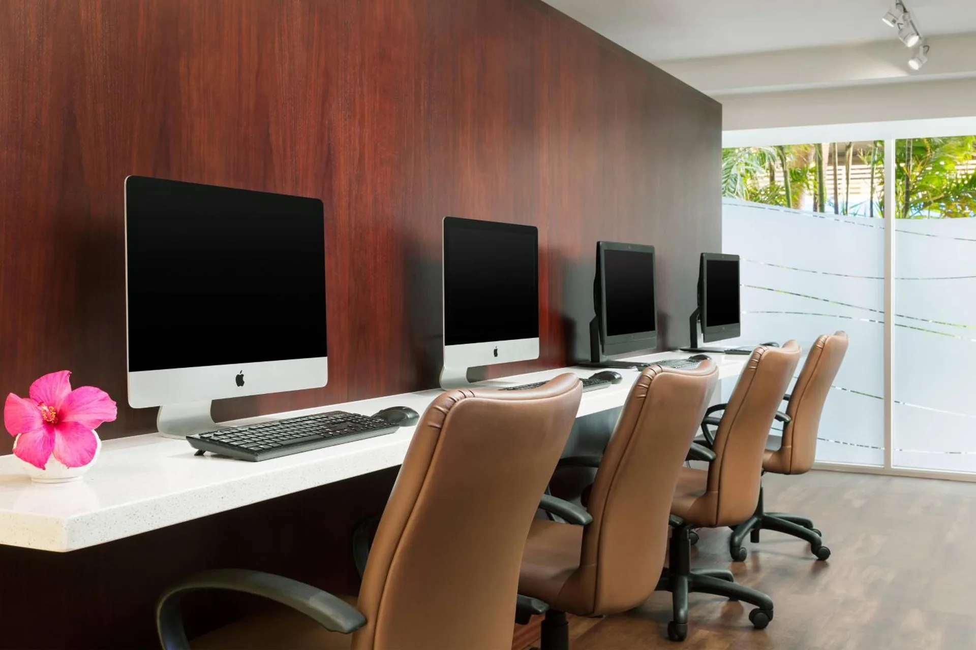 Business center with desktop computers at Courtyard Waikiki Beach.