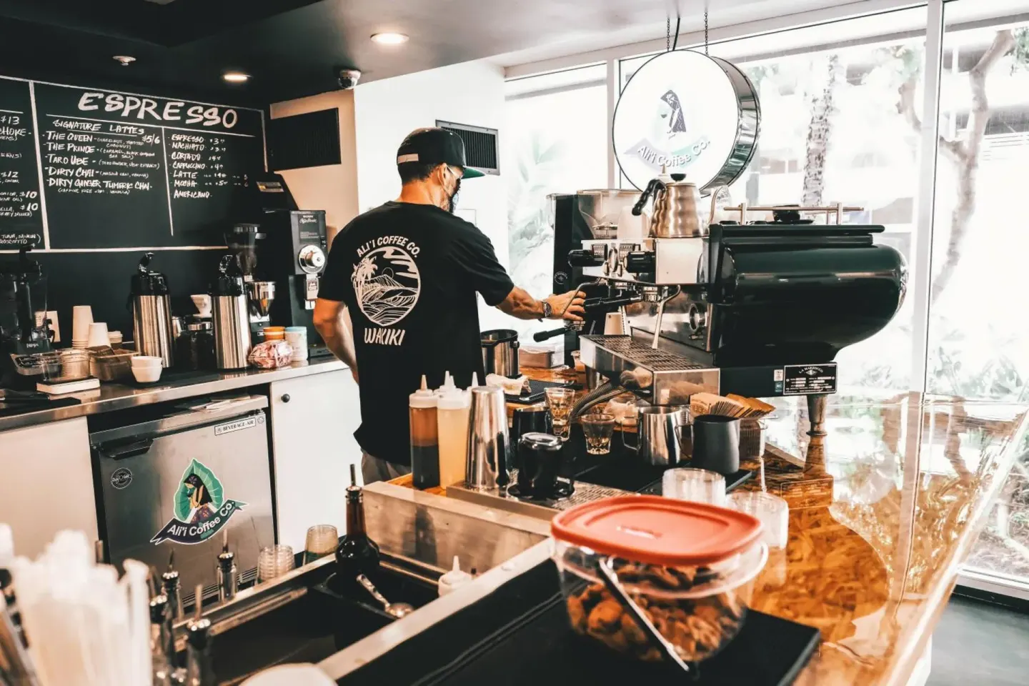 Barista preparing espresso at Ali'i Coffee Co. Waikiki at Courtyard Waikiki Beach.