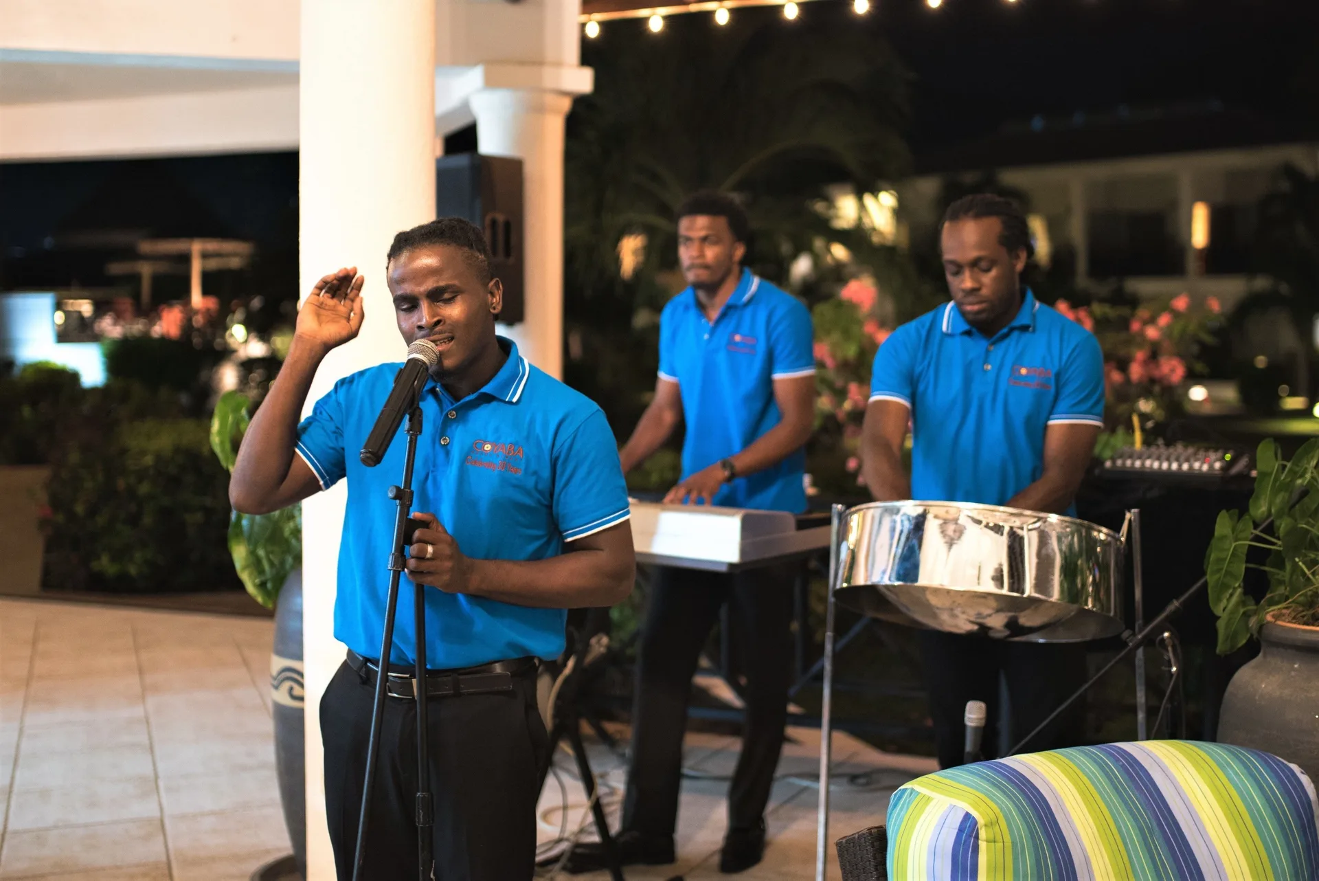 Live singer, keyboard player, and steel pan musician at Coyaba Beach Resort.