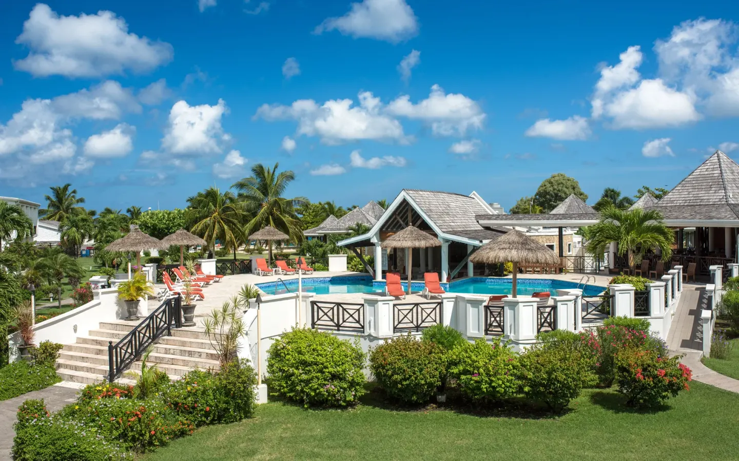 Elevated view of the pool terrace and gardens at Coyaba Beach Resort.