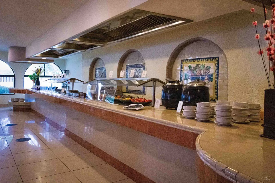 Buffet counter with hot soup pots and serving stations at Cozumel Hotel & Resort