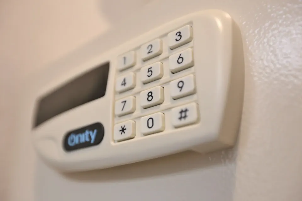 Keypad-style wall safe or alarm panel in a guest room at Cozumel Hotel & Resort.