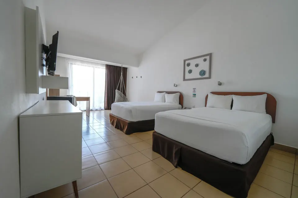 Spacious Superior Room with two beds and balcony at Cozumel Hotel & Resort