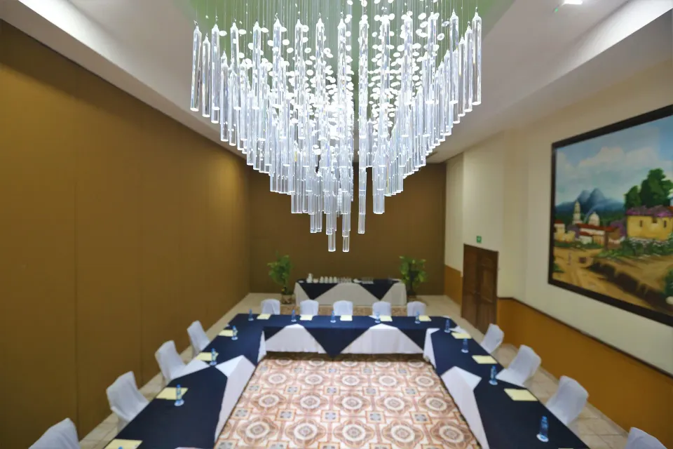 Meeting room viewed from above with large chandelier at Cozumel Hotel & Resort