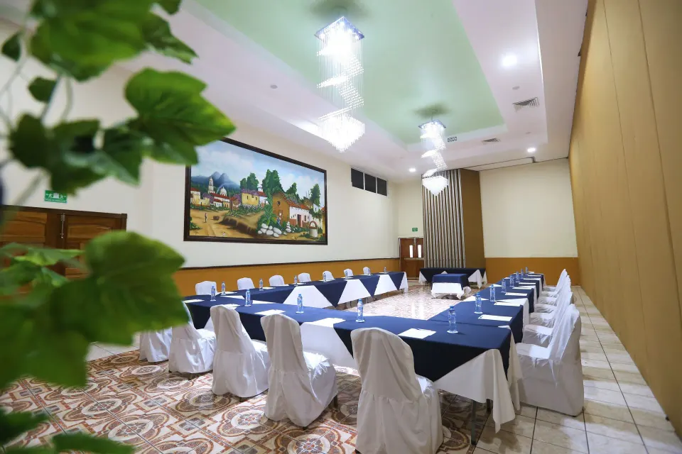 U-shaped conference table setup in meeting room at Cozumel Hotel & Resort