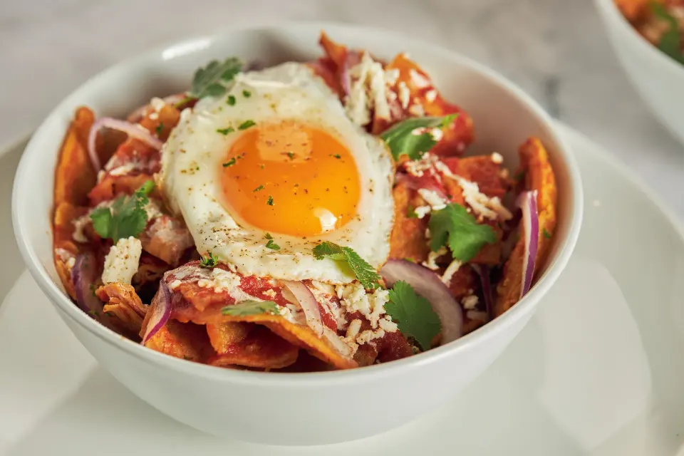 Bowl of chilaquiles with fried egg at Cozumel Palace