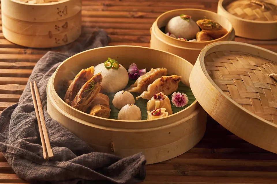 Bamboo steamer basket filled with dim sum at Cozumel Palace