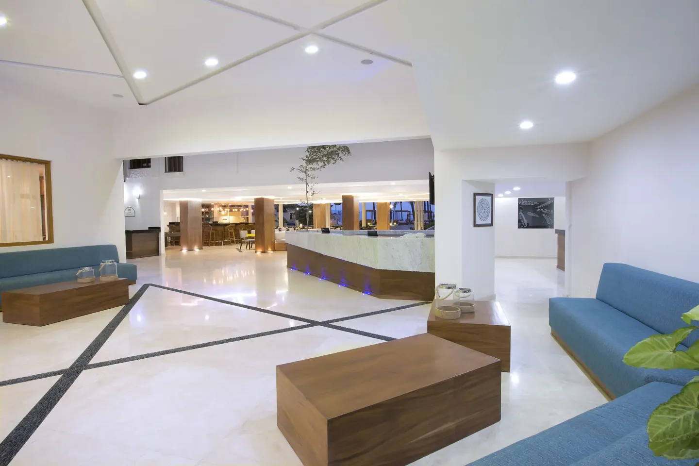 Lobby seating and reception area at Crown Paradise Golden Resort.