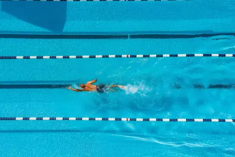 Swimmer in a lap lane pool at Curacao Marriott Beach Resort.