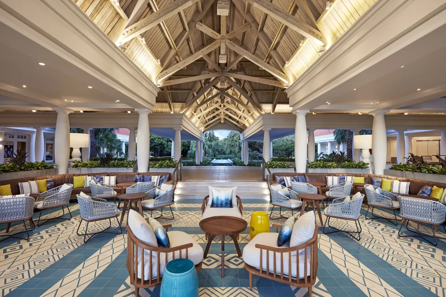 Open-air lobby seating under a vaulted wood ceiling at Curacao Marriott Beach Resort.