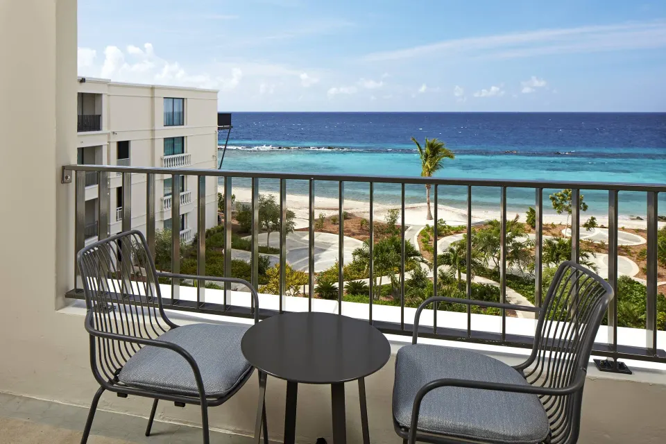 Furnished balcony with ocean view at Curacao Marriott Beach Resort.