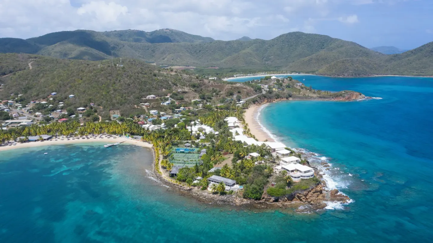 Aerial view of the resort between two beaches at Curtain Bluff Resort.