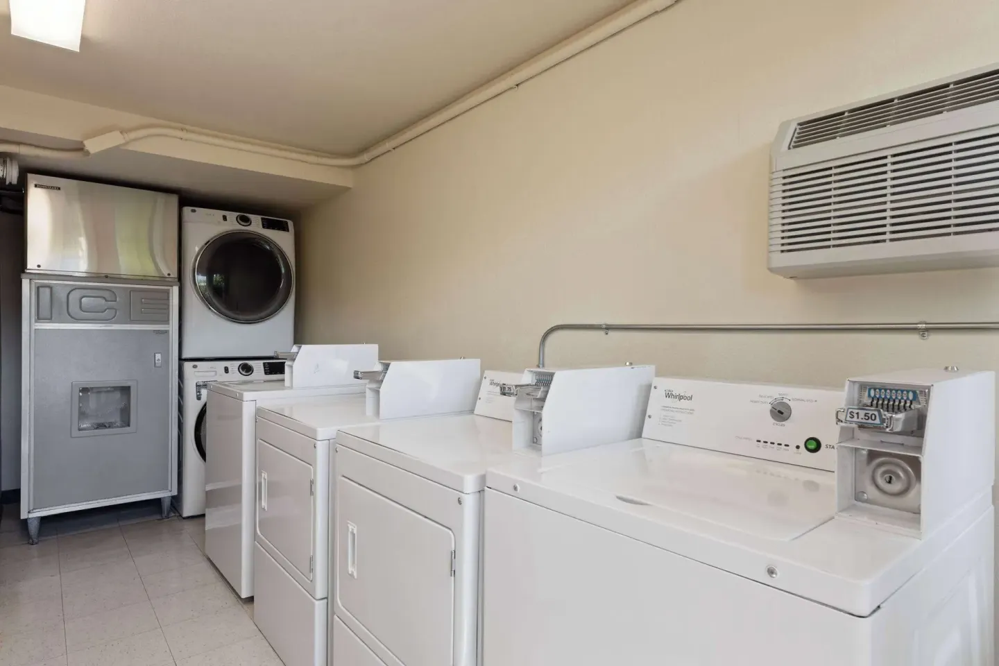 Coin laundry room with washers and dryers at Days Inn Maui Oceanfront.
