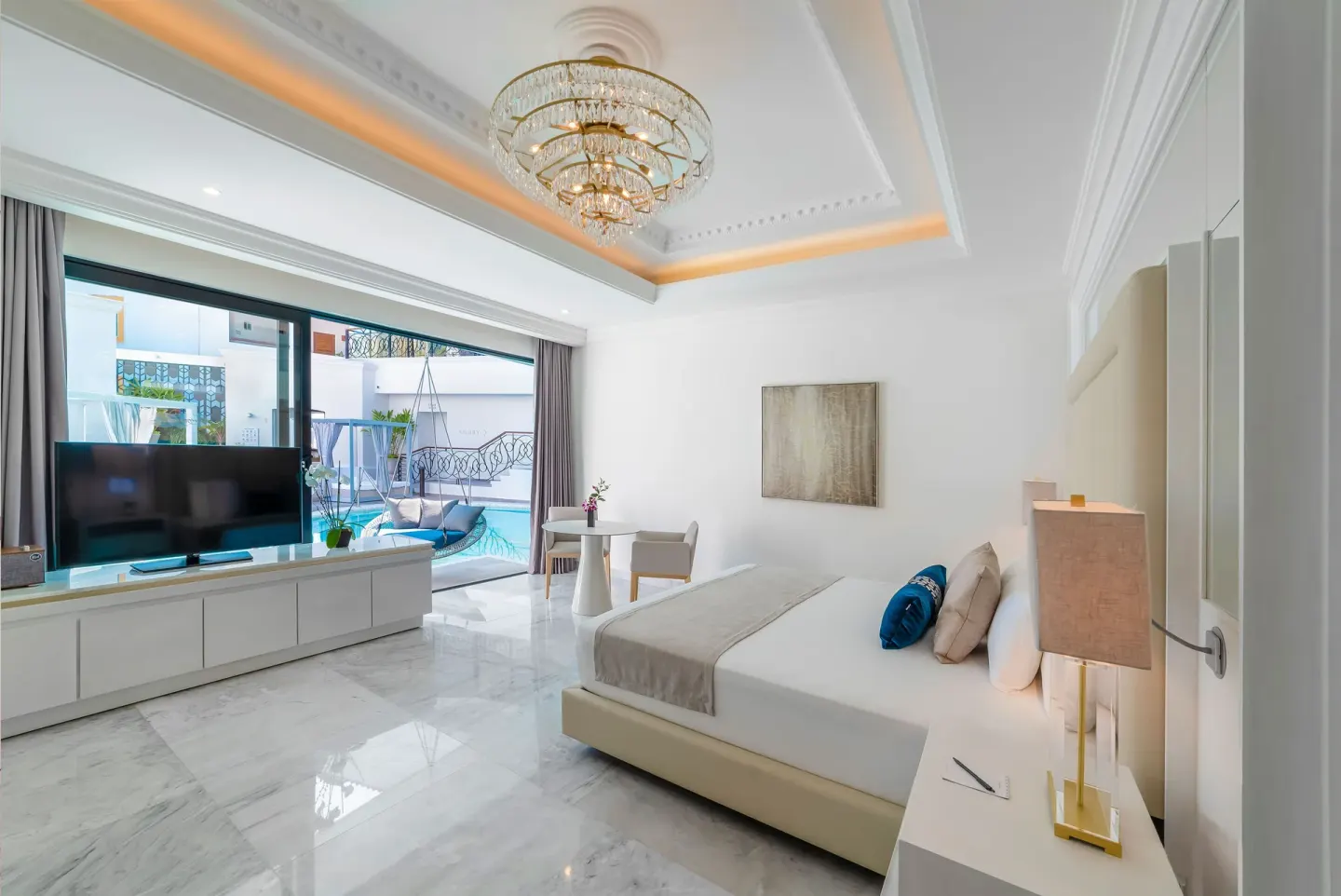 Mansion Jacuzzi Suite with king bed and terrace at Desire Pearl Riviera Maya Resort.