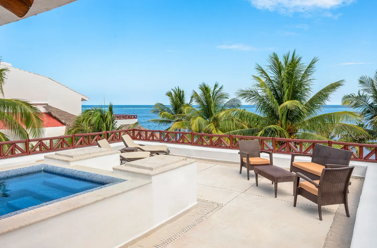 Penthouse Passion Suite oceanview terrace at Desire Pearl Riviera Maya Resort with plunge pool and seating.