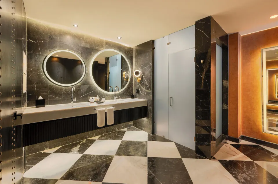 Diamond Ocean-View Jacuzzi Suite bathroom with double vanity at Desire Riviera Maya Resort.