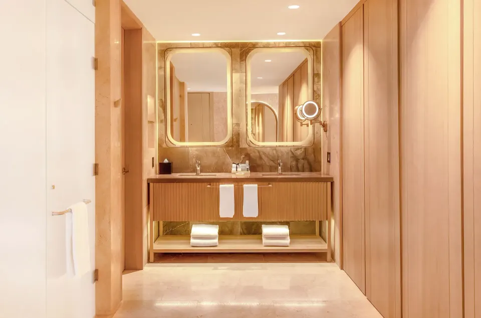 Seductive Pool View Jacuzzi Suite bathroom vanity at Desire Riviera Maya Resort.