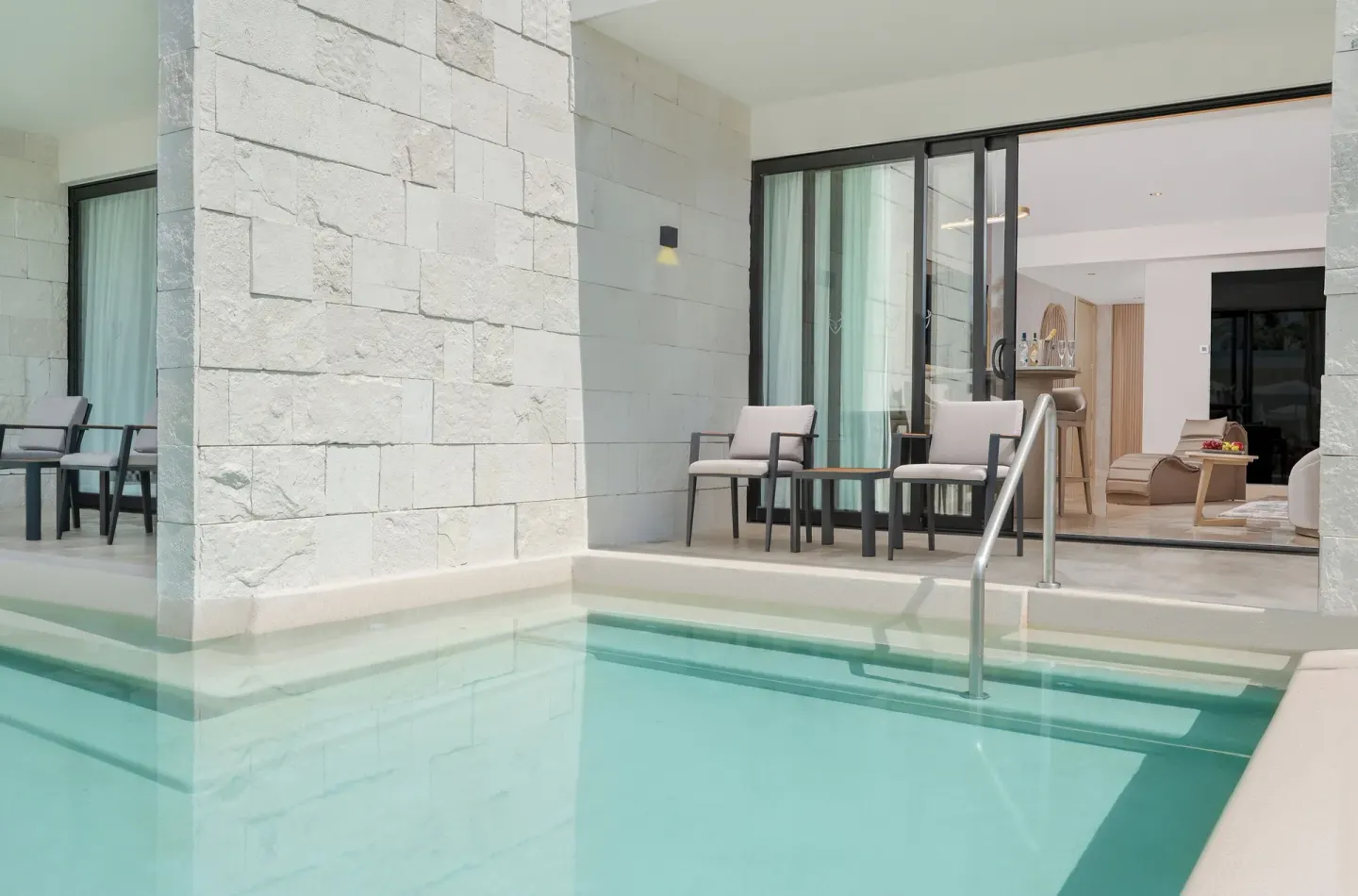 Swim-up suite terrace and pool at Desire Riviera Maya Resort.