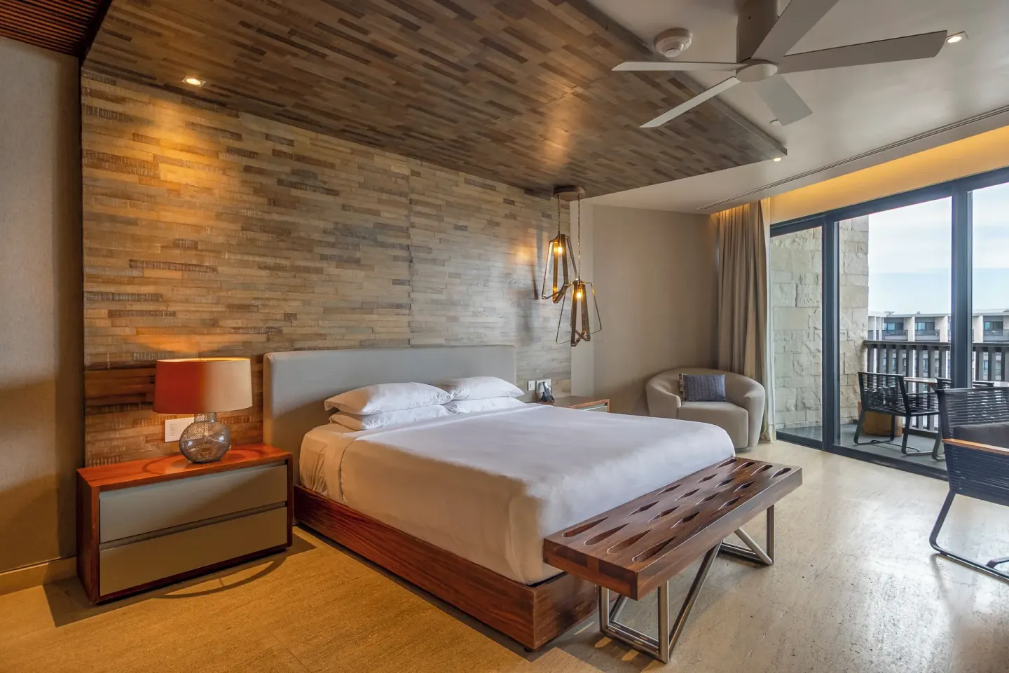 King bed guest room with balcony at Devossion By Live Aqua Playa del Carmen.