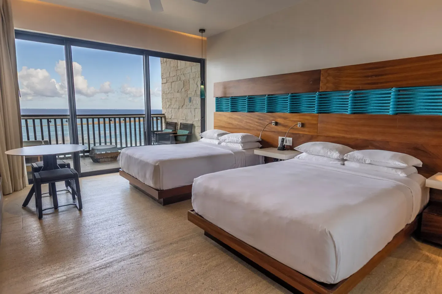 Two-bed oceanfront guest room at Devossion By Live Aqua Playa del Carmen.