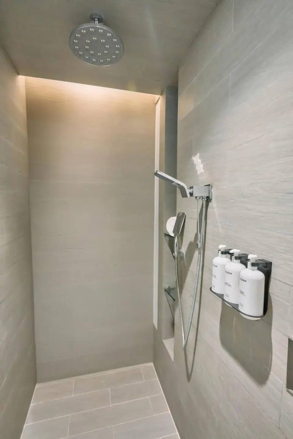 Premium Garden View walk-in shower at Devossion By Live Aqua Playa del Carmen.