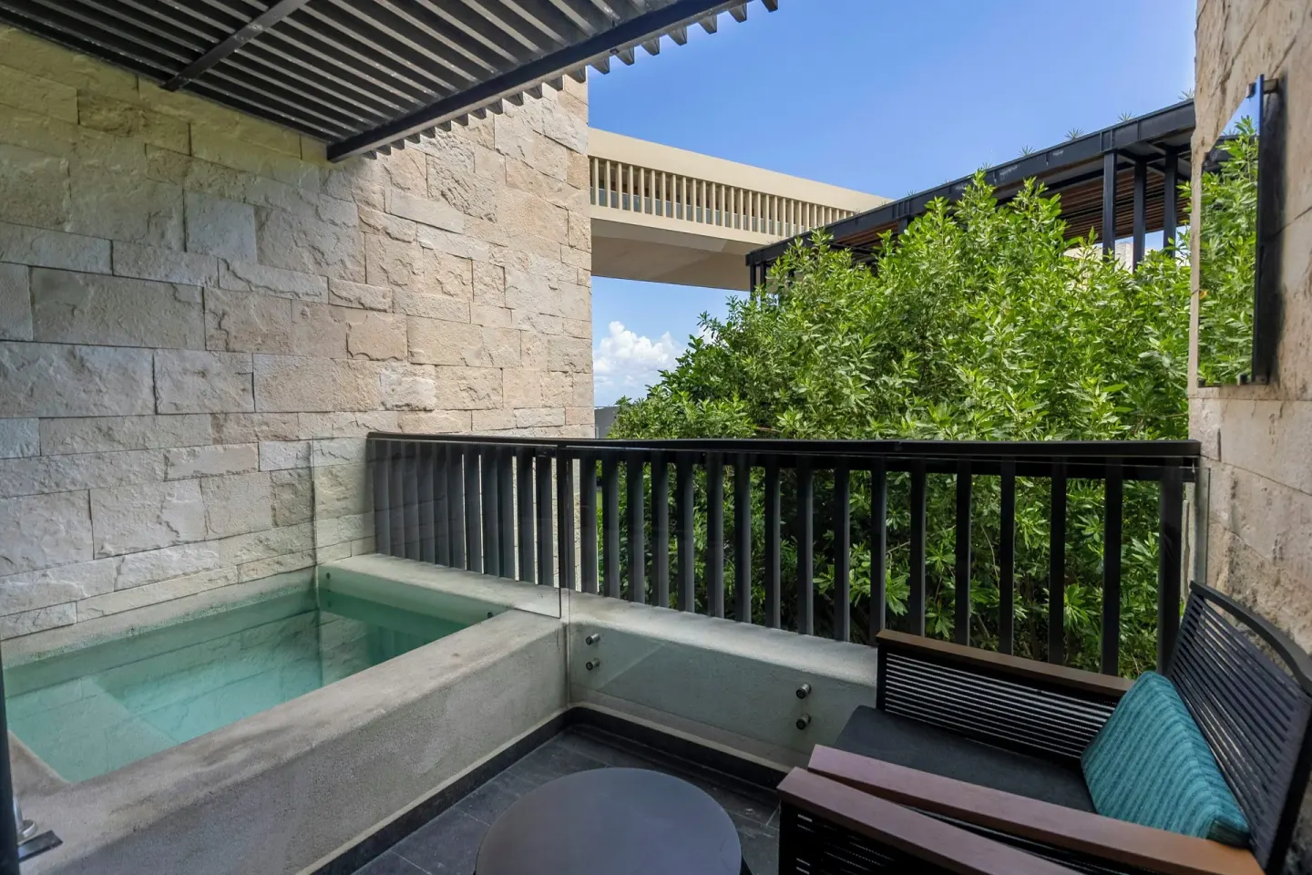 Private plunge pool terrace in a Premium Room at Devossion By Live Aqua Playa del Carmen.