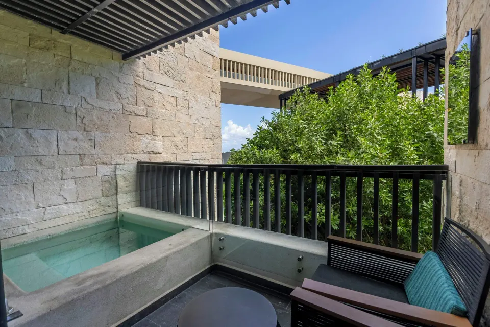 Private plunge pool terrace in a Premium Room at Devossion By Live Aqua Playa del Carmen.