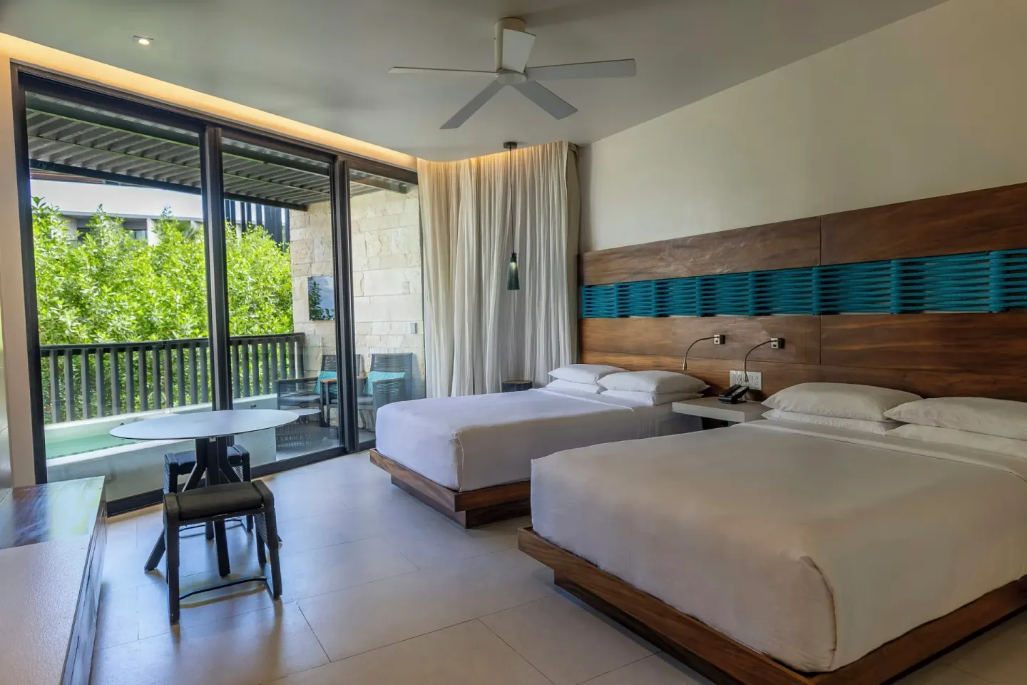 Premium Room with two beds and garden-view plunge terrace at Devossion By Live Aqua Playa del Carmen.