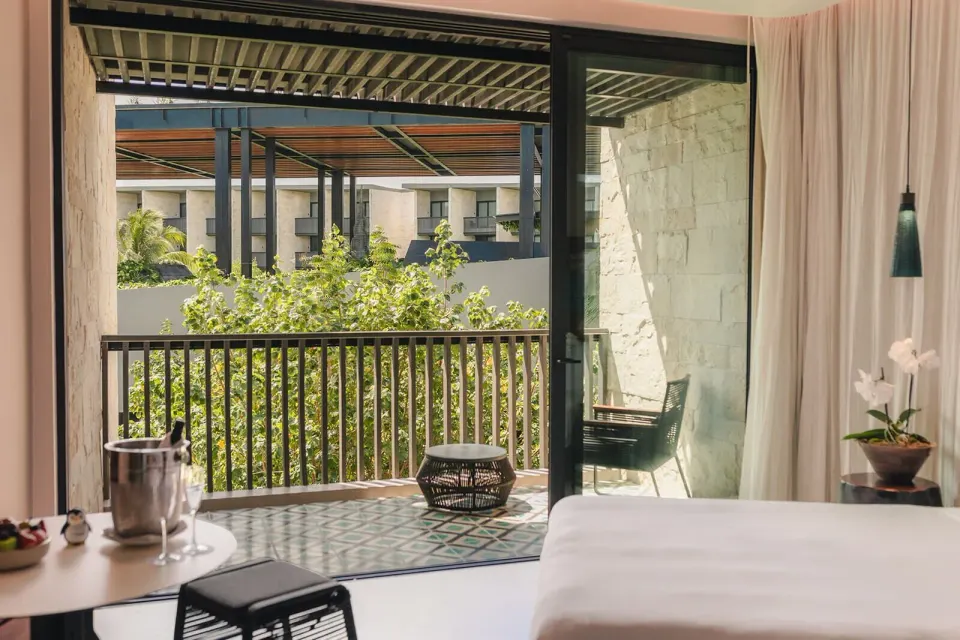 Premium Room balcony and garden view at Devossion By Live Aqua Playa del Carmen.
