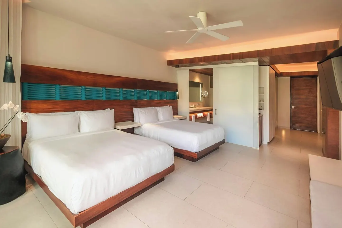 Spacious Premium Room with two double beds at Devossion By Live Aqua Playa del Carmen.