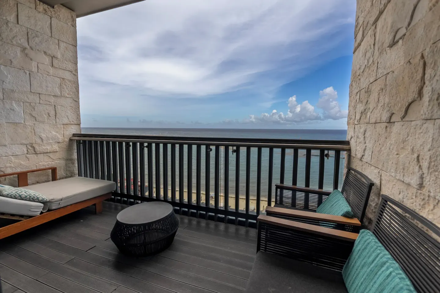 Oceanfront terrace seating for a Premium Room at Devossion By Live Aqua Playa del Carmen.