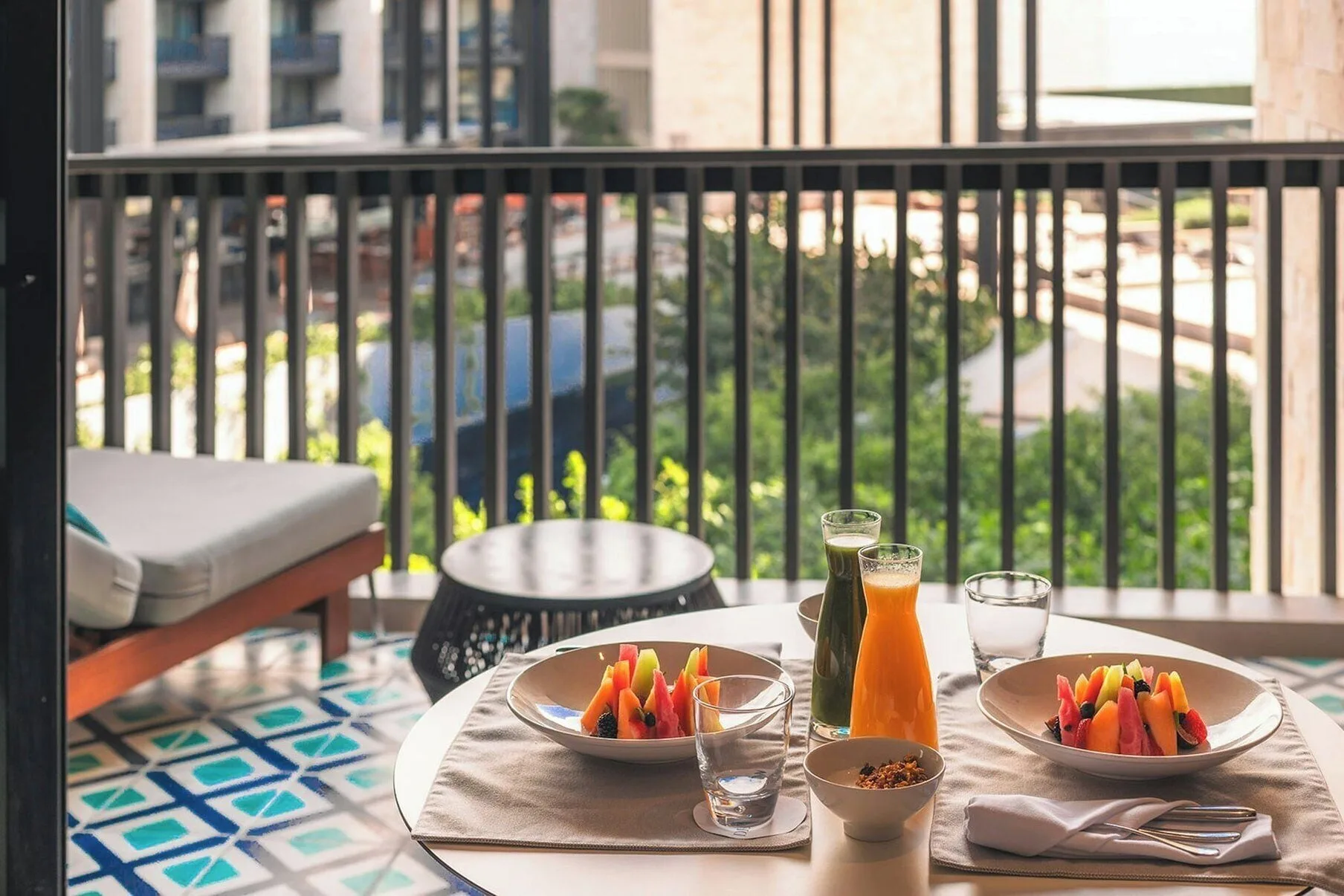 In-room breakfast by the balcony in a Premium Room at Devossion By Live Aqua Playa del Carmen.