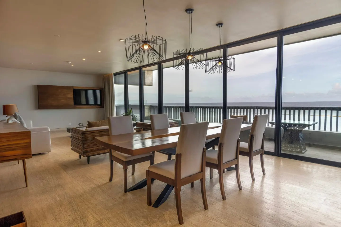 Presidential Suite dining area and balcony view at Devossion By Live Aqua Playa del Carmen.