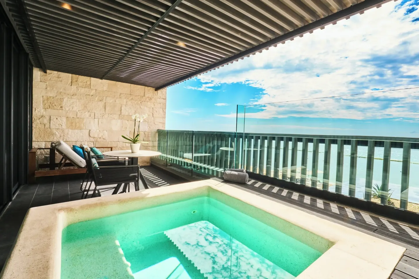 Elixir Plunge Pool suite terrace with private plunge pool and ocean view at Devossion By Live Aqua Playa del Carmen.