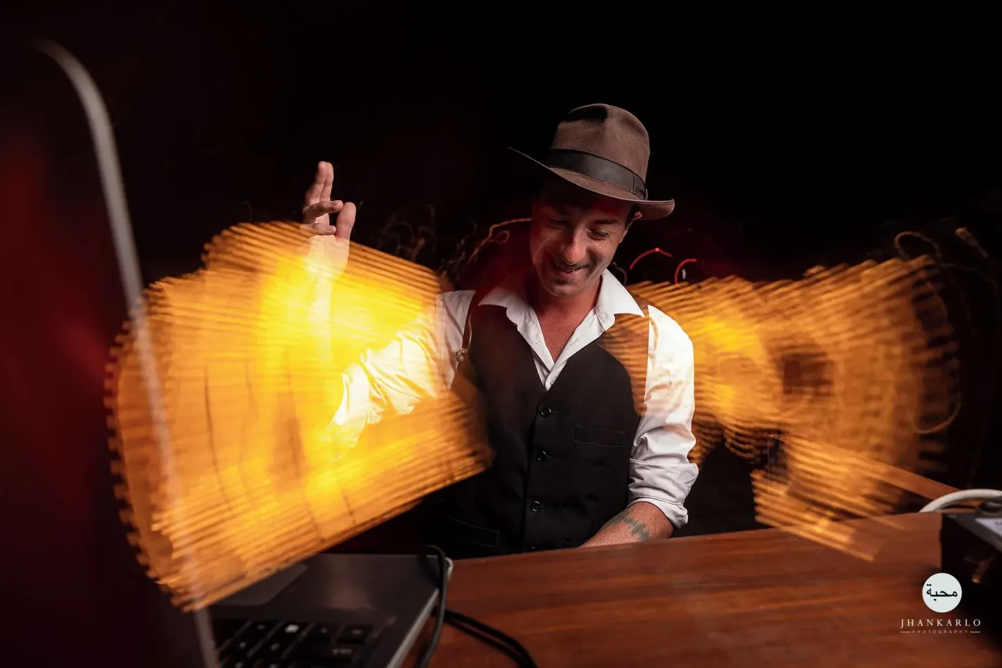 DJ performing with light trails at Devossion By Live Aqua Playa del Carmen.