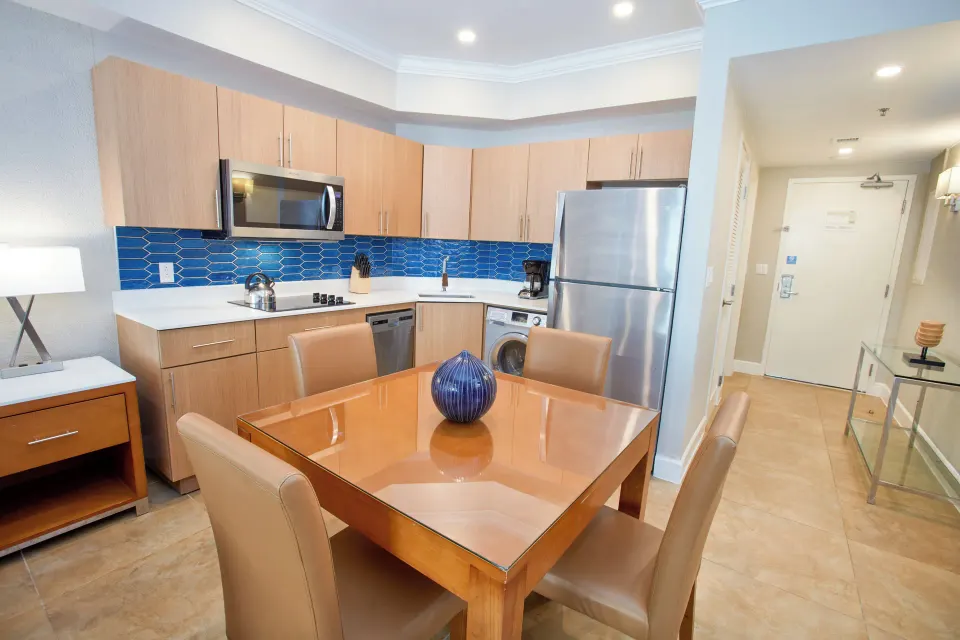 Beach Tower Studio Suite kitchen and dining table at Divi Aruba Phoenix Beach Resort.